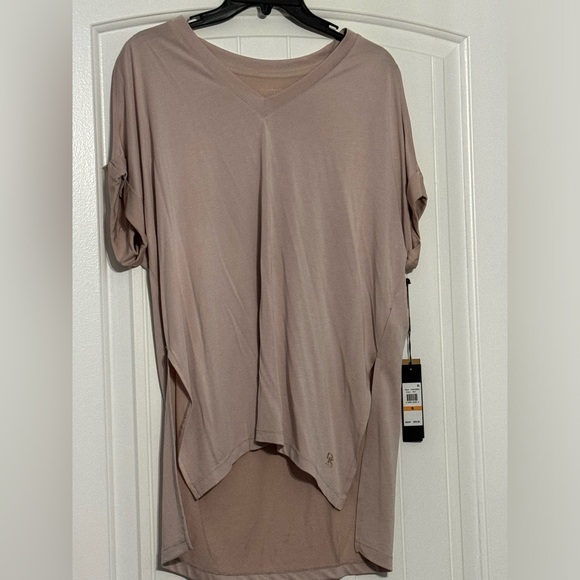 Donna Karan Tops - Short sleeve shirt with cut out shoulders shirt is a peachy pink color